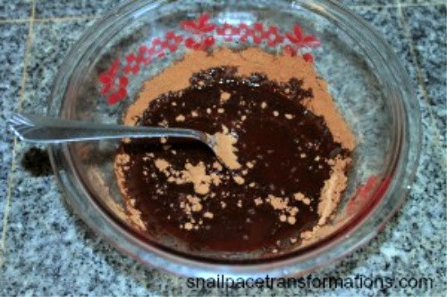 Next step in making these homemade vegan chocolate bars is to stir in the cocoa powder. 