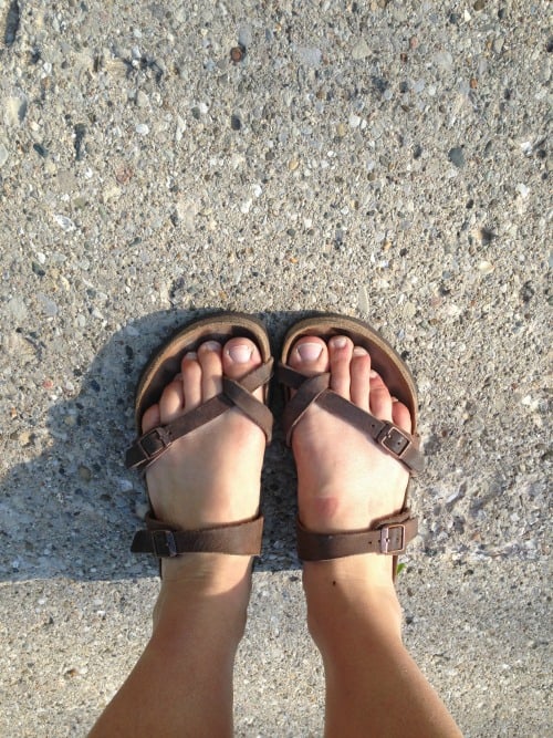 My feet on my sidewalk at the end of our 22 week RV road trip.